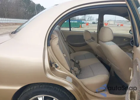 2001 Kia Rio z USA, uszkodzony, nr VIN KNADC123X16014652